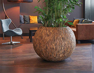 een natuurlijke uitstraling met een houten plantenbak! Designpotten.nl